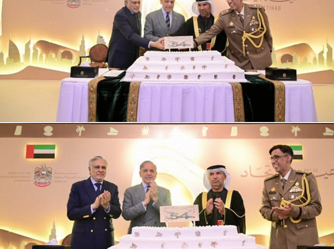 Prime Minister Muhammad Shehbaz Sharif cuts cake at a ceremony of the national day of the United Arab Emirates.