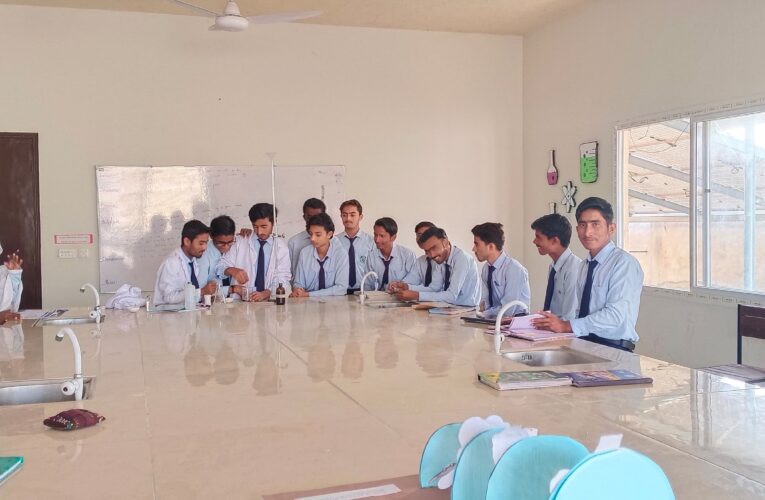 Students at People’s Higher Secondary School Dhoronaro Comrade Omoon Mal Musafar Campus are busy with a practical chemistry experiment to determine the purity of sodium carbonate.